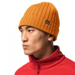 Jack Wolfskin Rippstrickmütze (Beanie) Stormlock RIP Knit (winddicht, Fleecefutter) Bernsteingelb Herren